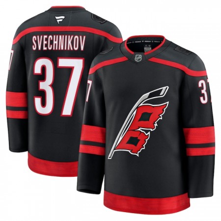 Miehille NHL Carolina Hurricanes Pelipaita Fanatics Premium Andrei Svechnikov 2024-25 koti Musta